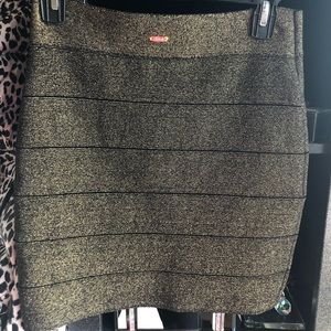 SALE Bebe Black and gold bandage skirt